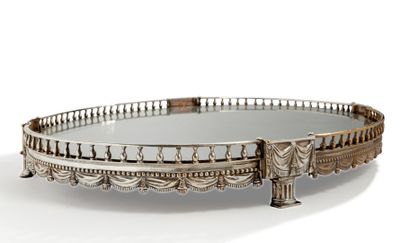 null Important silvered bronze centerpiece of oval shape standing on four fluted...