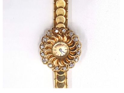 null Lady's wristwatch in 18k (750) gold. Round case, back snap closure, bears the...