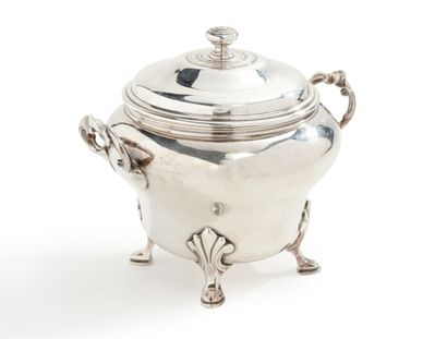null Covered sugar pot in plain silver standing on four feet with leafy attachments,...