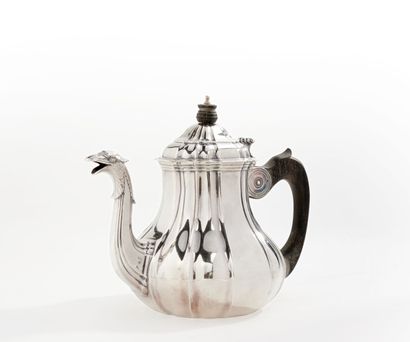 null Silver teapot of baluster form with flat bottom with straight and pinched sides,...