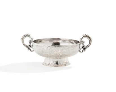 null Silver wedding cup standing on a foot with embossed decoration of leafy medallions,...