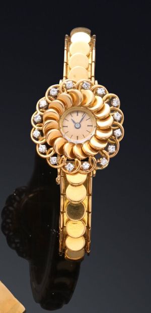 null MONTRE bracelet de dame en or 18k (750). Boîtier rond, fond fermeture à pression,...