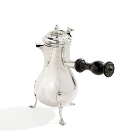 null Tripod silver coffee pot of baluster form, the feet skates, the versoir covered,...