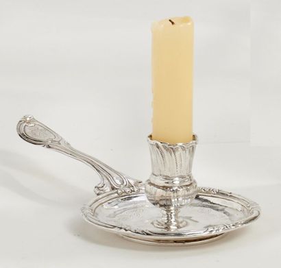 null Hand candlestick in silver underlined by nets and leafy clasps, the handle engraved...
