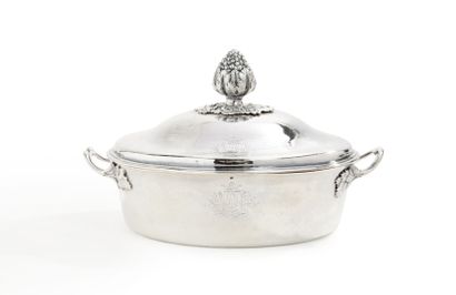 null Covered silver vegetable dish, the handles crossed with leafy attachments, the...