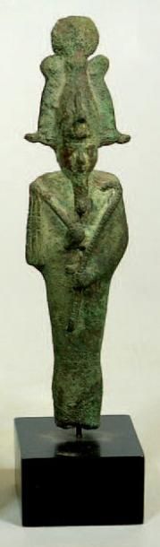 null Osiris en bronze, coiffé de la couronne atef et tenant ses attributs, fouet...