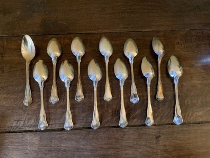 null Twelve spoons of table in silver 925 thousandths, model net shell. 
Weight :...