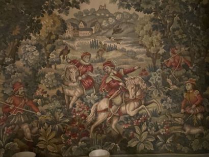 null Mechanical woolen tapestry with polychrome decoration of a hunting scene. 
20th...
