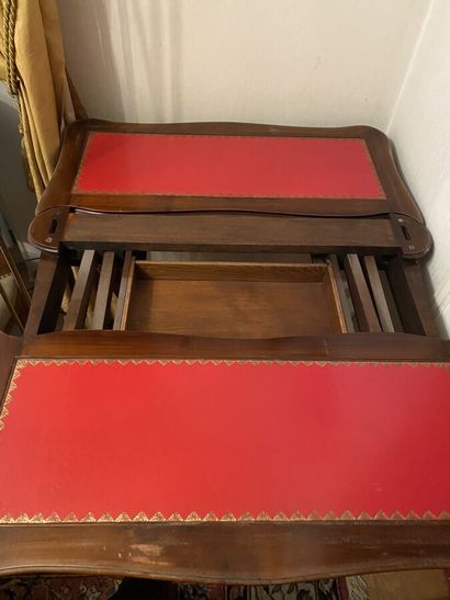 null Square game table in wood veneer opening to a drawer in belt, with several trays...