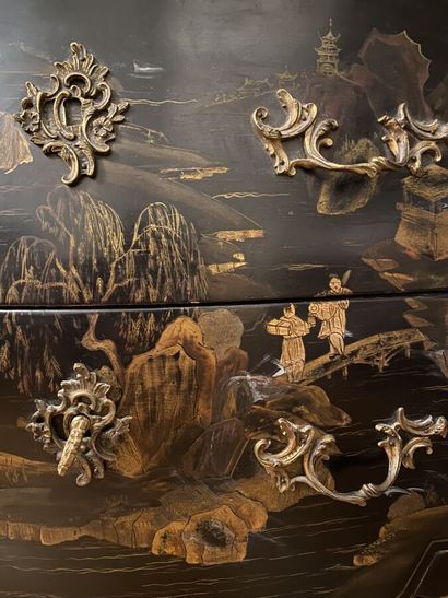 null COMMODE of curved form out of lacquered wood with decoration of lacustrian landscapes...