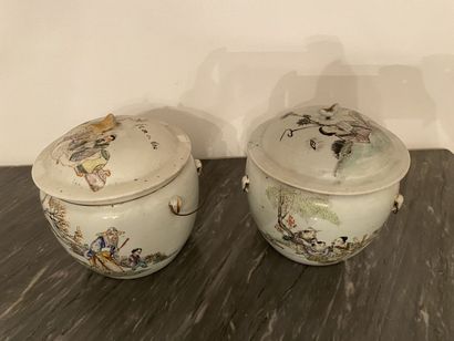 null CHINA
Three porcelain ginger pots with polychrome decoration of characters in...