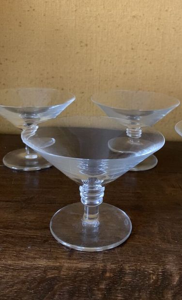 null SAINT LOUIS 
Suite of eleven crystal champagne glasses 
Height 9 cm, Diameter...