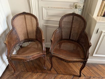 null TWO shepherds' chairs in molded and carved natural wood, the backs, seats and...