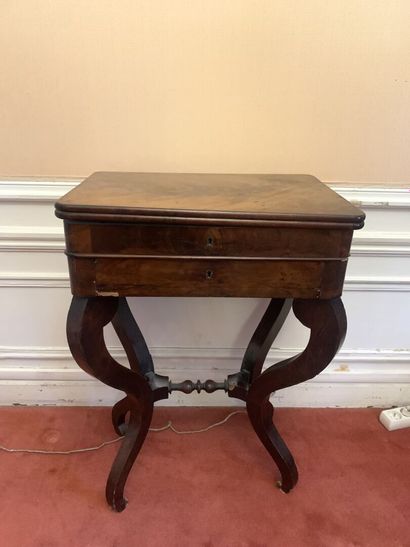 null Small working table in wood veneer opening to a flap and a drawer in belt.
75...