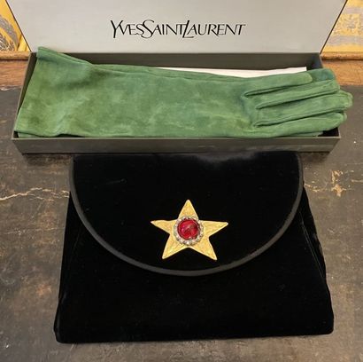 null YVES SAINT LAURENT
Black velvet evening clutch decorated with a star set with...