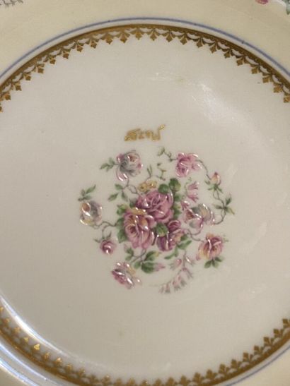 null LIMOGES
Part of a porcelain dessert service decorated with bouquets of flowers...