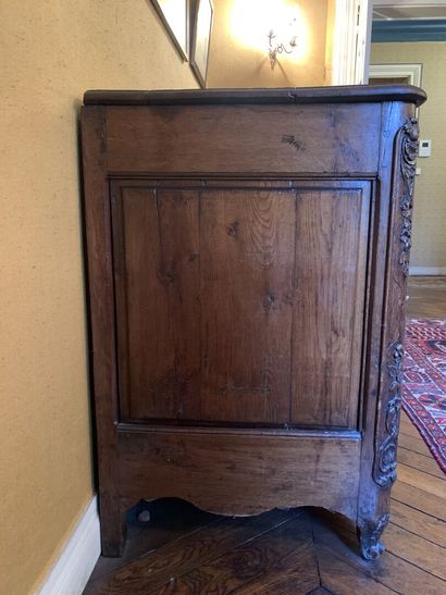 null Normandy BUFFET in oak opening to two doors with richly carved decoration of...