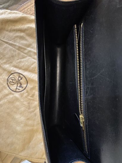 null HERMES, Paris 
Constance bag in black calfskin. 
Shoulder strap model, gilded...