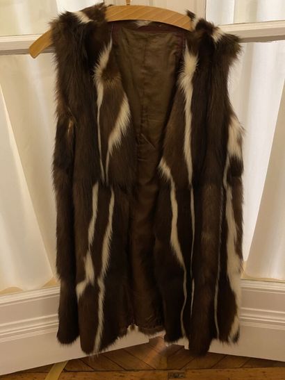null Set of three long, short, sleeveless fur coats in mink, fox and faux fur, and...