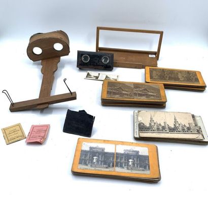 null Two stereoscopic viewers and a set of photographic plates on cardboard and paper....