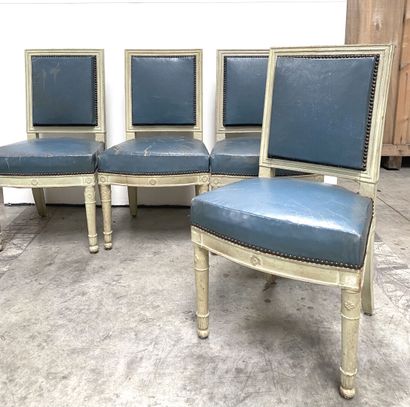 null Four chairs with flat backs, in cream-colored wood, resting on four legs, those...