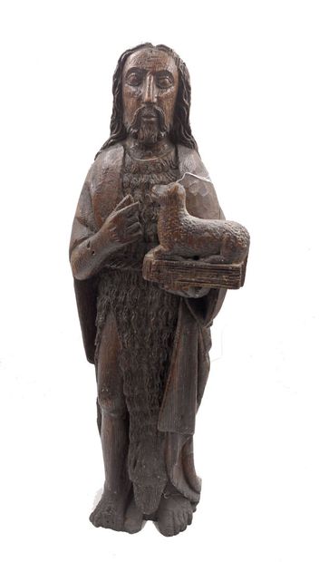 null Sujet en bois sculpté figurant Saint Jean-Baptiste accompagné de l'agneau.
XIXe...