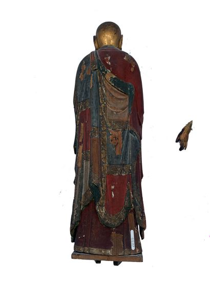 null Japon, XVIIIe siècle 
Bouddha debout en bois peint polychrome.
Haut. : 54 cm...