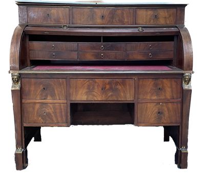 null Mahogany and mahogany veneer cylinder desk, the upper part opening to three...