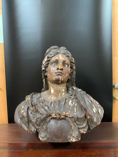null Buste en bois sculpté et patiné figurant la Vierge Marie.
XIXe siècle
54 x 52...