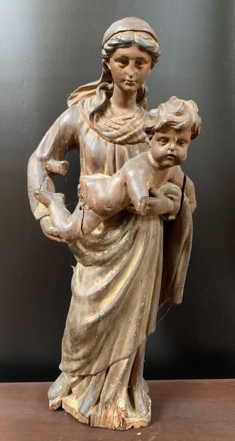 null Sujet en bois sculpté et partiellement doré figurant une Vierge à l'enfant.
XIXe...