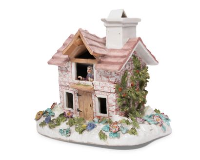 null MEISSEN
Porcelain group representing a woman at the window of a barn on a rectangular...
