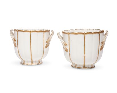 null MENNECY
Pair of soft porcelain refreshment buckets with ribs
in relief underlined...