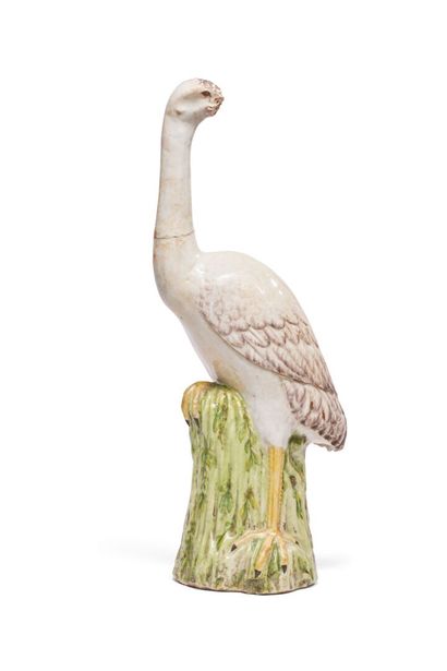 null China
Statuette of heron in porcelain on rushes, with polychrome decoration...