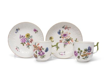 null MEISSEN
Four cups and their saucer in porcelain with patterns of wickerwork...