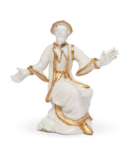 null SAINT-CLOUD OU ITALIE
Figure de Chinois en porcelaine tendre, assis sur un rocher,...