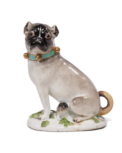 null Meissen
Porcelain figure of a pug, sitting on an oval base decorated with flowers...