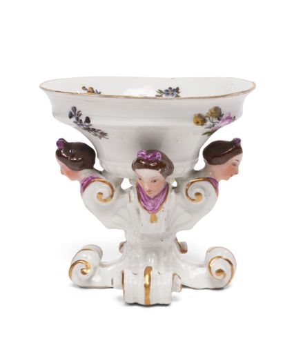 MEISSEN
Oval porcelain cup resting on four...