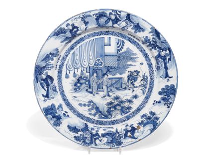 null Delft
Grand plat rond en faïence à décor en camaïeu bleu de trois Chinois dans...