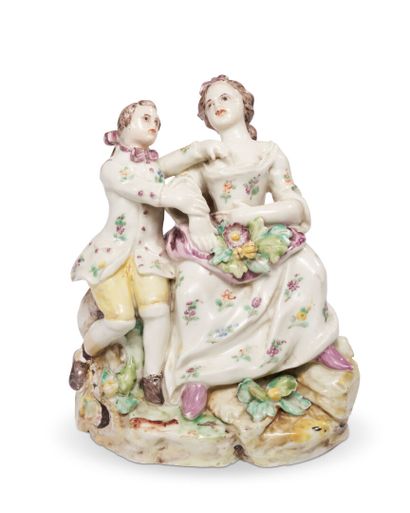 SEALS
Group of two figures in soft porcelain...