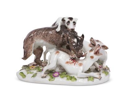 null MEISSEN
Groupe en porcelaine représentant un loup attaqué par trois
chiens sur...