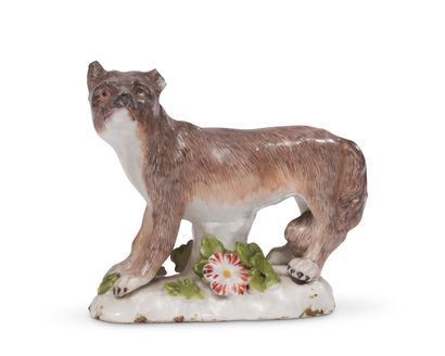 Porcelain statuette representing a fox on...