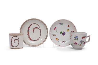 null DOCCIA
Two porcelain cups and saucer, one with polychrome decoration of flowers
of...