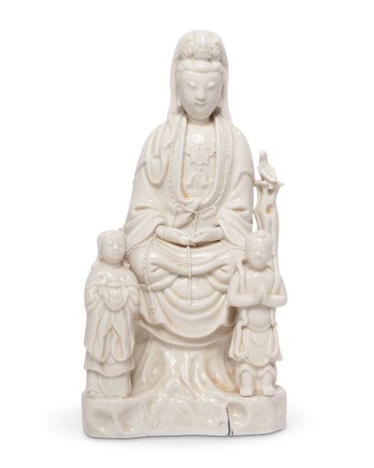 null CHINA
Chinese white porcelain group
representing a seated guanyin
accompanied...