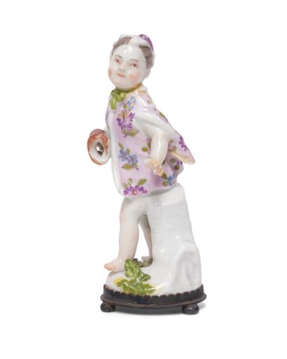 null MEISSEN
Porcelain statuette representing a love disguised under the features...