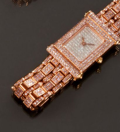 null OJ PERRIN
Milady
Montre bracelet de dame en or rose 18k (750) avec diamants....