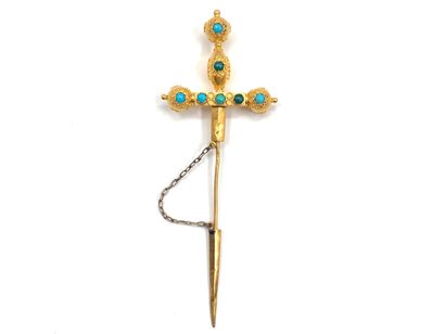 null Brooch in yellow gold (E.T. mark) representing a sword, the handle decorated...