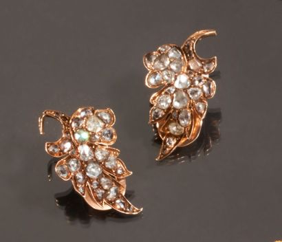 null Set decorated with foliage and rose-cut diamonds, including a pair of earrings...