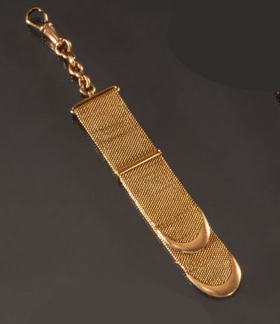 null Elément de chaine giletière en or jaune 750 millièmes décoré d'un motif ceinture.
Hauteur...