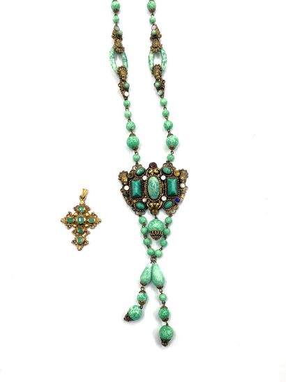 null Lot decorated with emeralds or imitation stones including: a cross pendant in...
