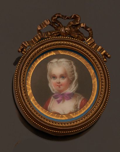null Gilt metal brooch of oval shape, the interior containing a miniature depicting...